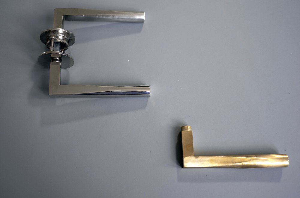 Vicky_Door_Handles_LEVER-HANDLES-ON-TABLE.jpg